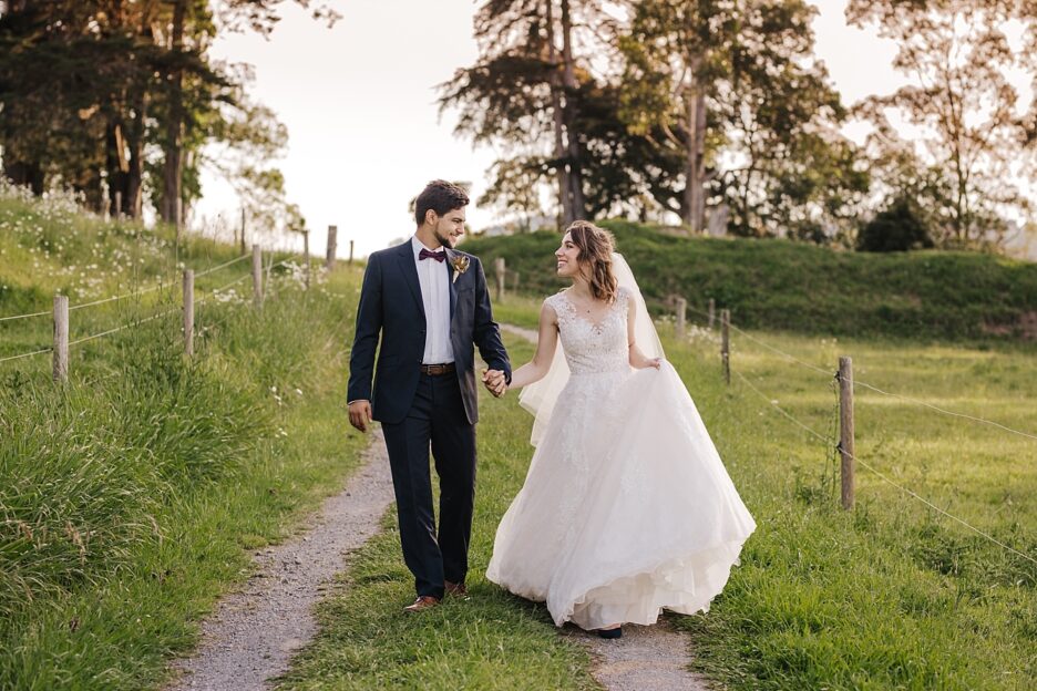 Relaxed wedding couple in country setting