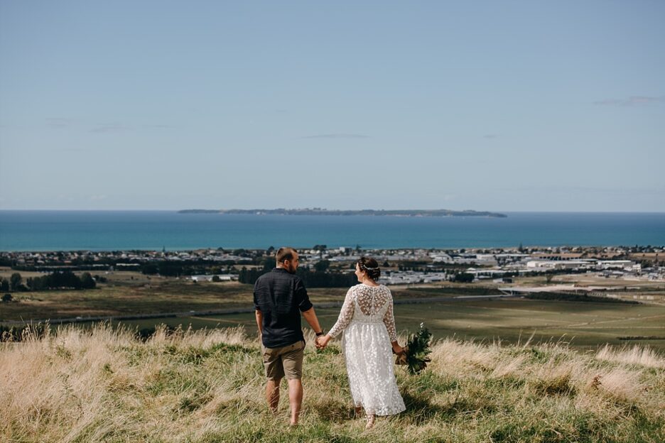 Papamoa Hills overlooking the sea for wedding photos by Pure Images Photograpphy