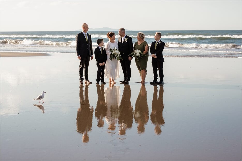 Rustic country sage green wedding party on beach at Hart Street