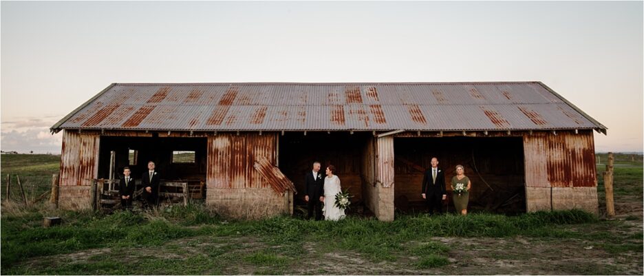 Papamoa country wedding couple by barn