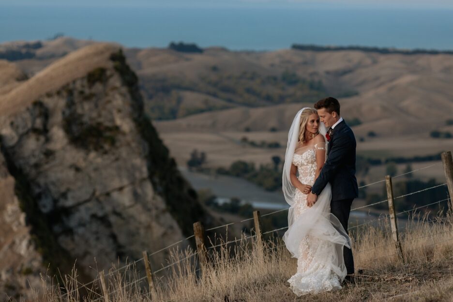 Cliff top wedding pictures with Hawkes Bay views