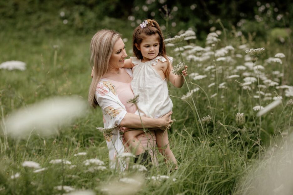 country setting natural family photo with little girl and aunt