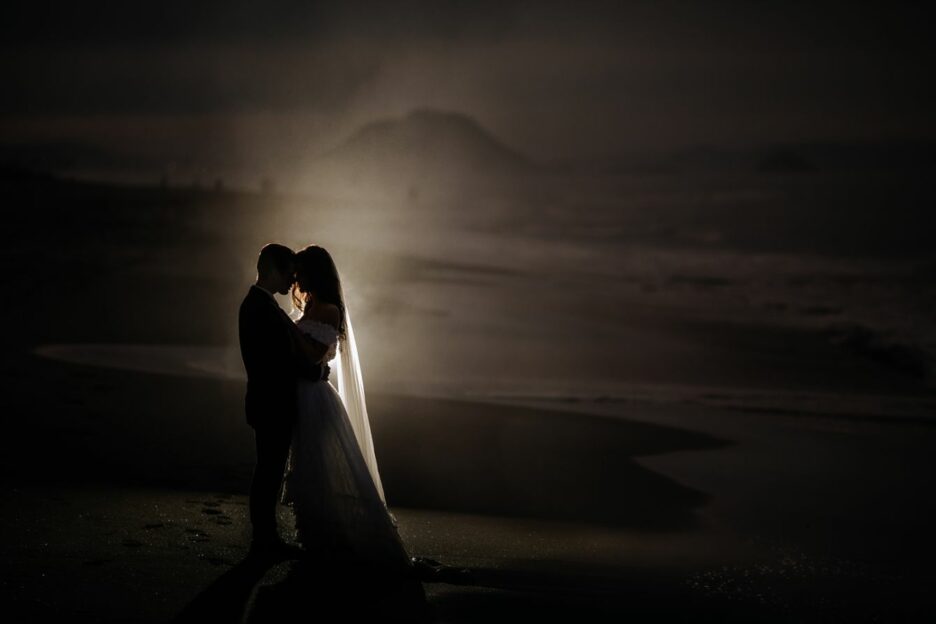 Sea spray landscape photo of bride and groom