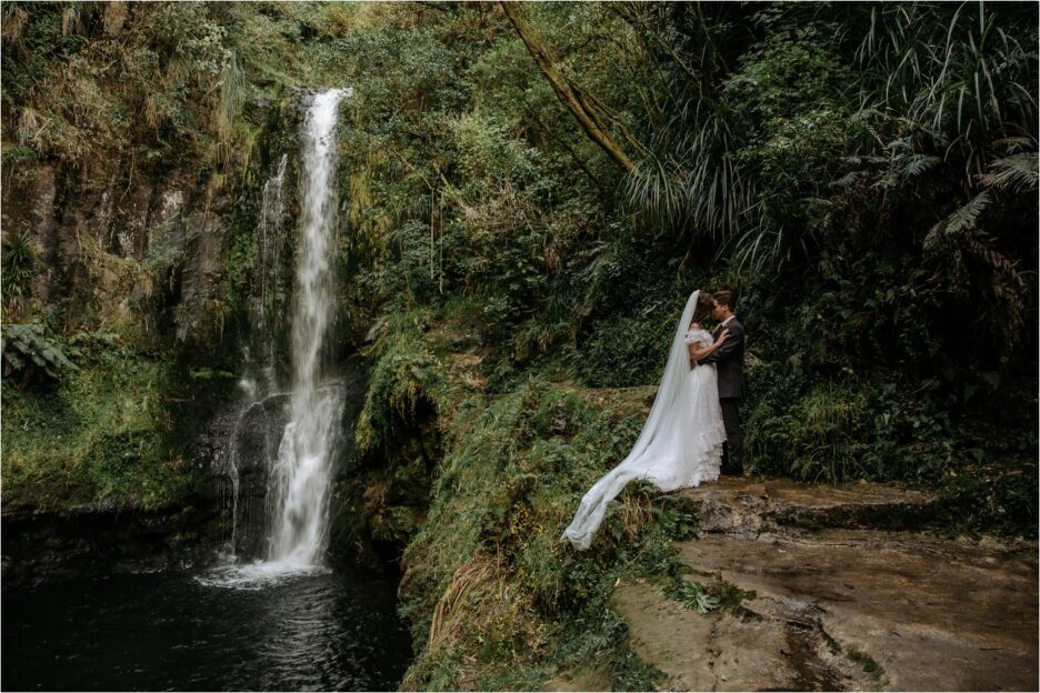 Landscape wedding photo of Kaiate Falls