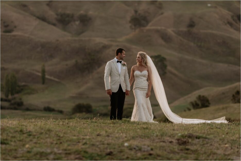 Wedding couple walking the hills