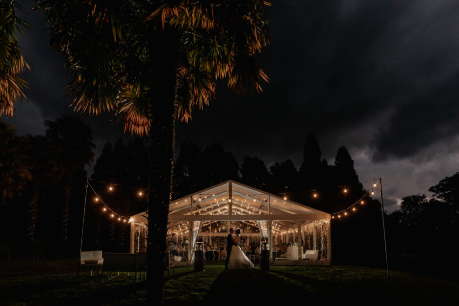 Wedding marquee at back yard wedding at night time in Tauranga
