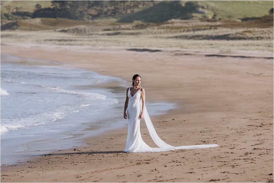 Wedding photo of bride on beach