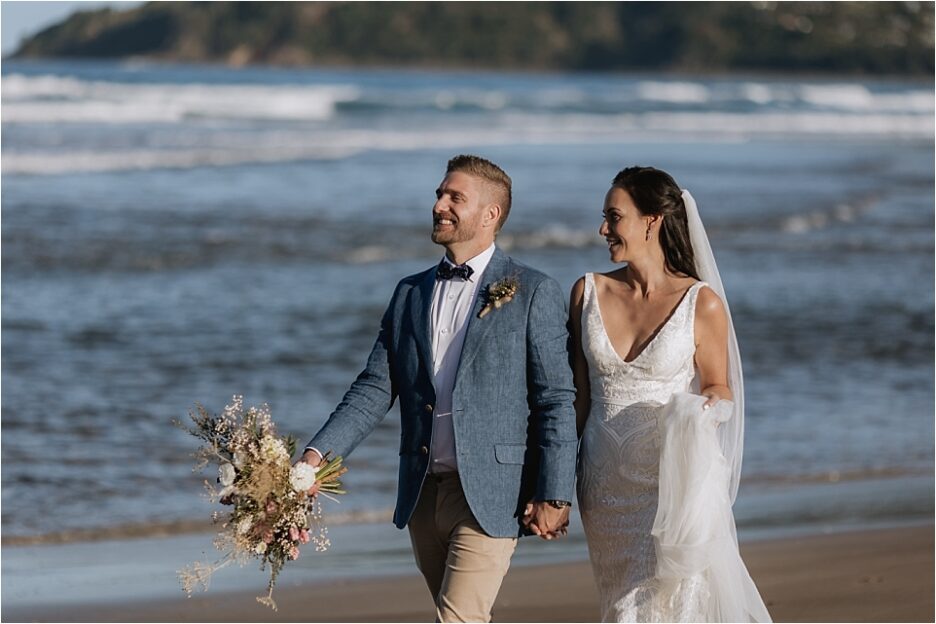 Happy natural candid wedding photos at Hot Water Beach NZ