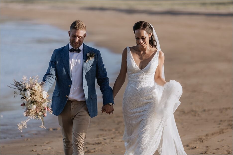 Moments between bride and groom on Hot Water Beach with Pure Images Photography