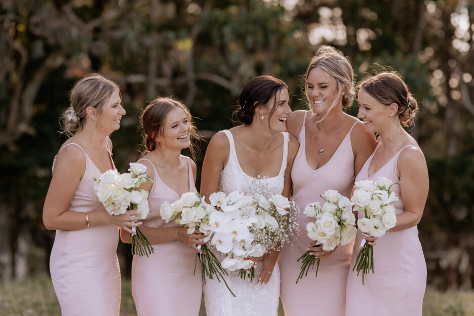 Bridal party happy photos in pink dresses