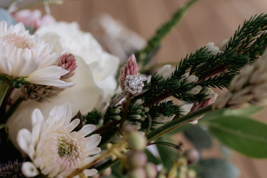 engagement ring in flowers bouquet
