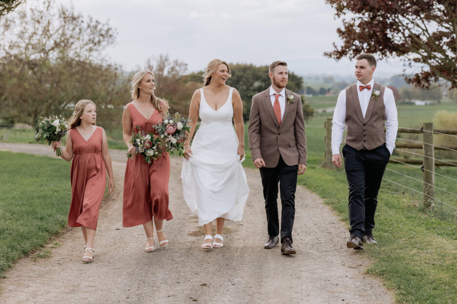 smoky browns country wedding party walking