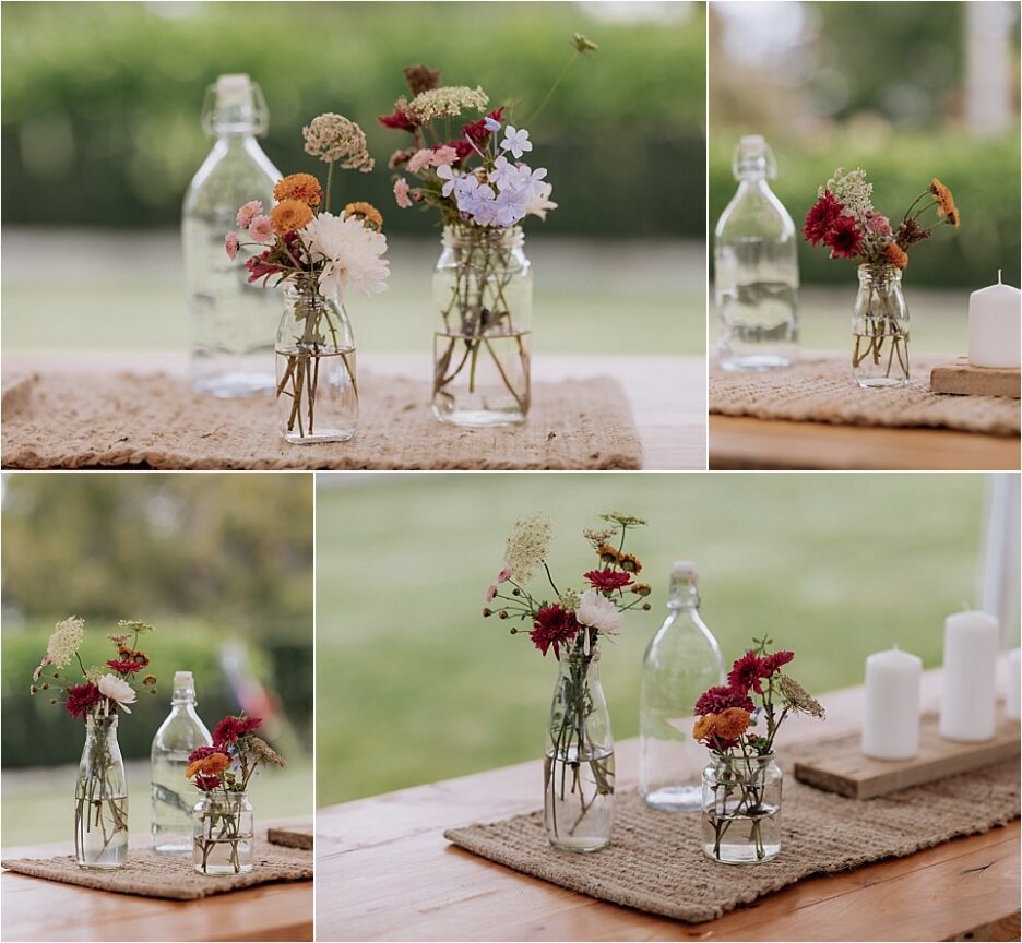 table settings country vases with flowers on hessian runners