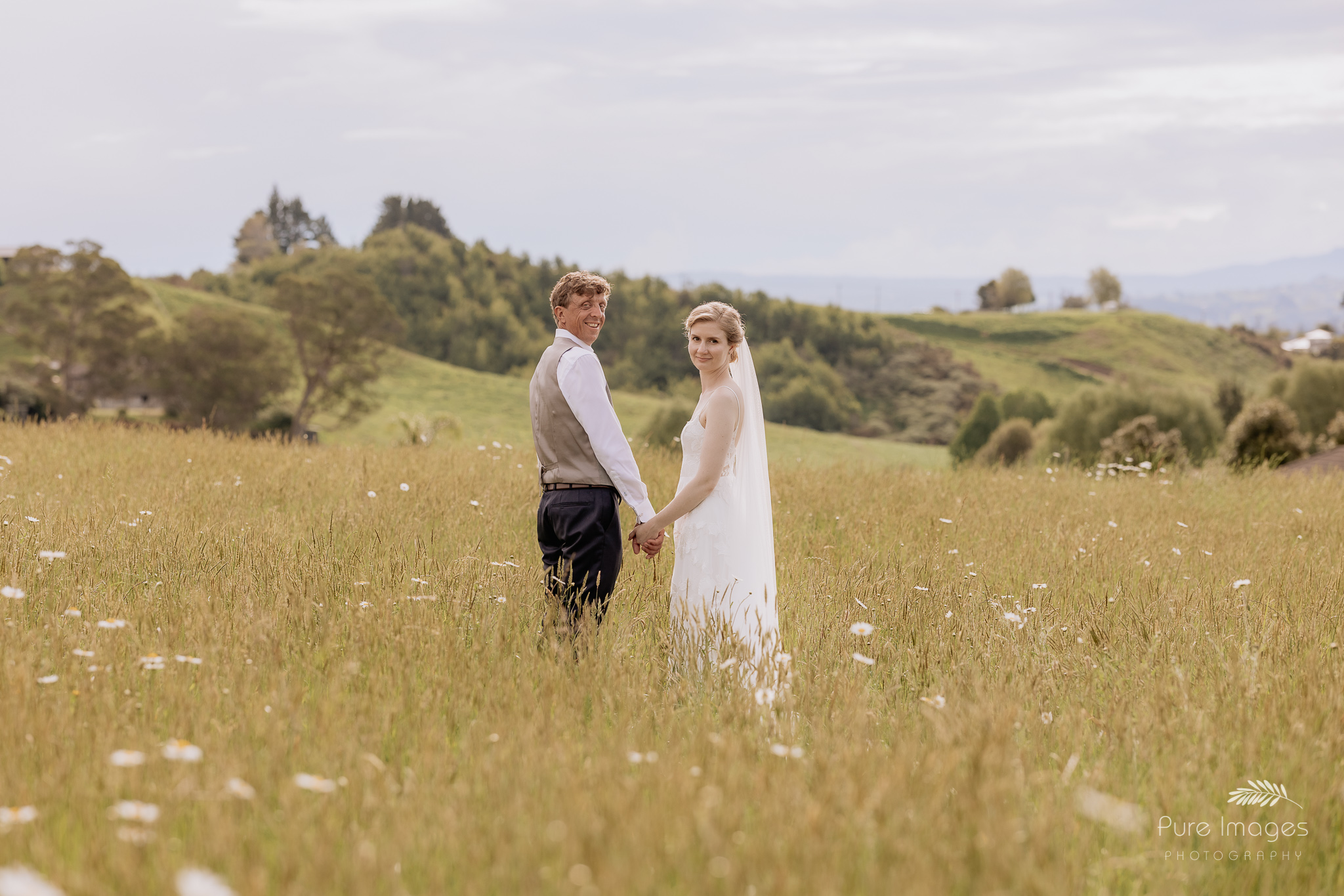 wedding couple in field