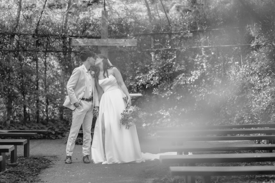 couple kissing in tree church