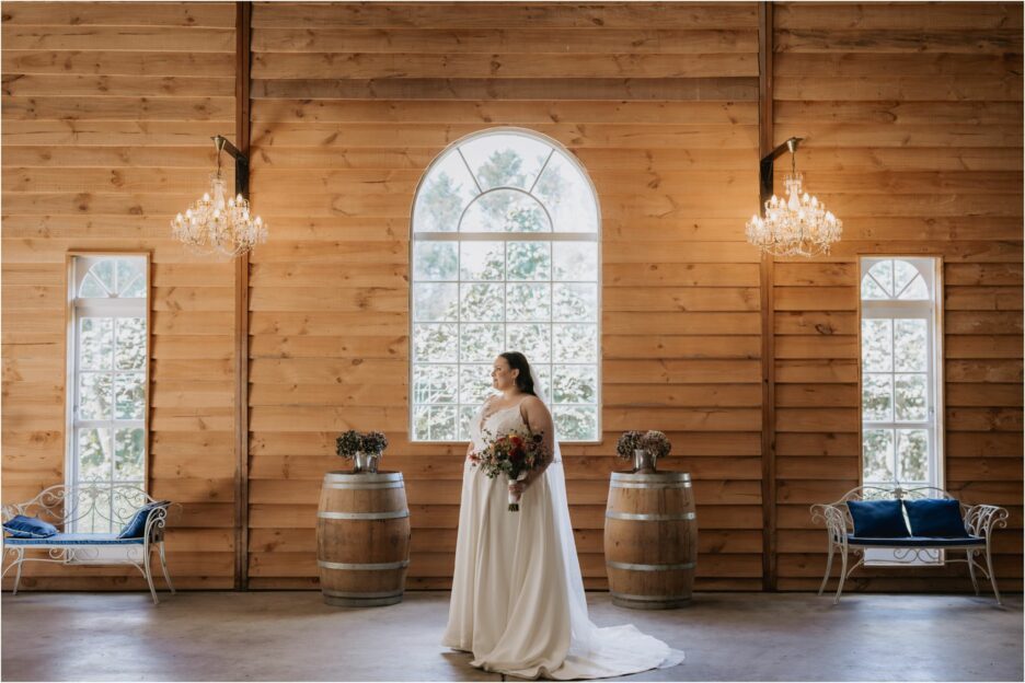 bride under chandeliers ebony vines