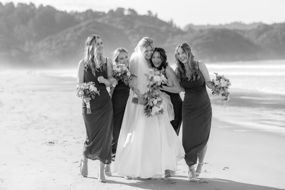 laughter of bride and bridesmaids giggling waihi beach