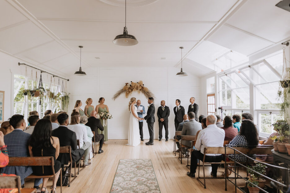 wedding ceremony in progress at old forest school inside the school house