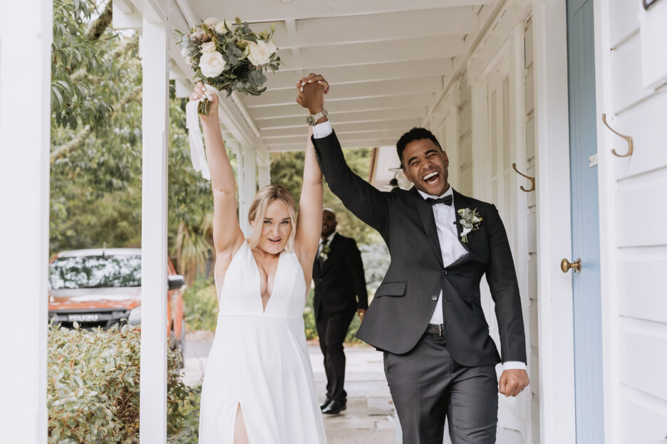 just married celebrating couple Old forest school house verandah