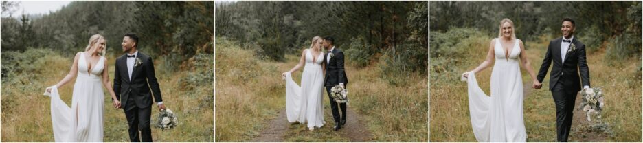 happy smiling bride on groom walking forest road old forest school wedding venue