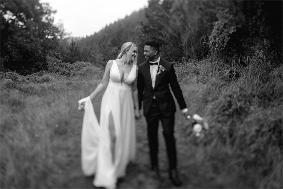 wedding couple walking country lane in the forest photo taken with vintage tilt shift lens