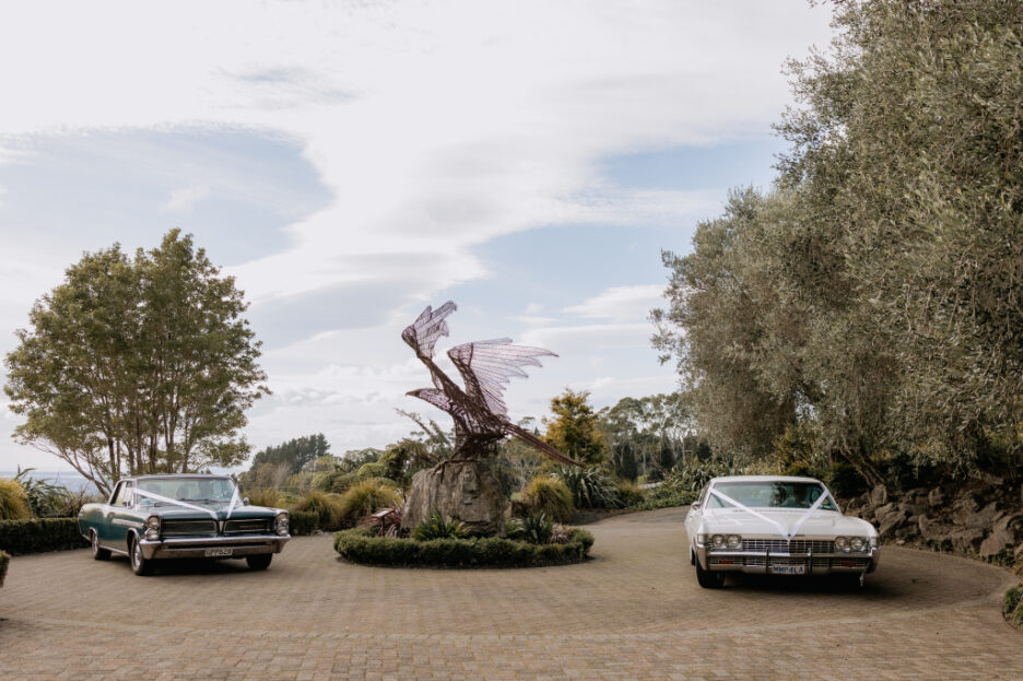 Eagle sculpture with wedding cars