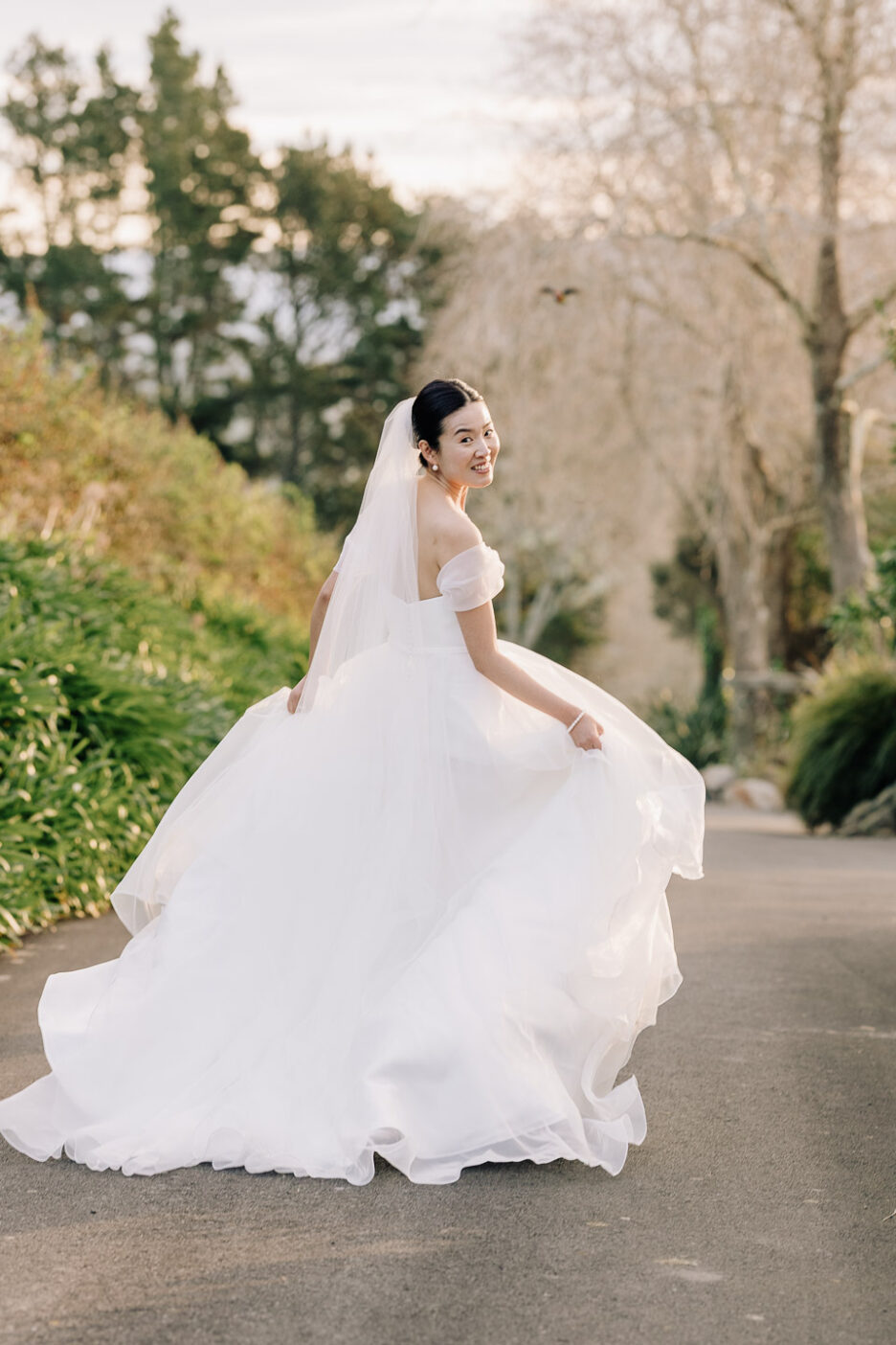 beautiful bride running driveway