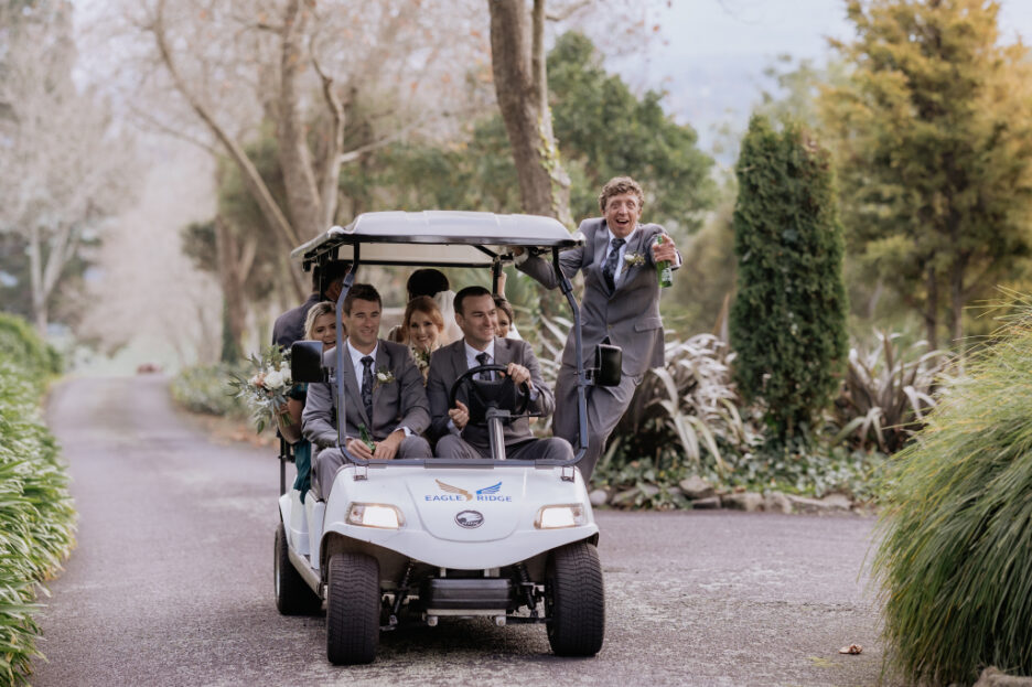 wedding party driving golf cart